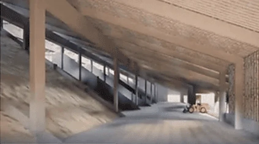 Projeto do interior do armazém de fertilizantes, com pá carregadeira
